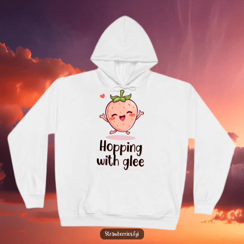 Funny Kawaii strawberry character hopping with a wink featured on a cozy hoodie, perfect for comfort.