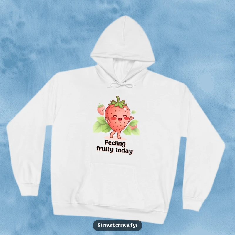 Funny hoodie featuring a blushing strawberry character joyfully dancing with its leaves, for cozy sweet vibes.