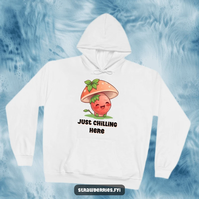 Funny hoodie featuring a giggling strawberry character peeking from beneath a mushroom, offering cozy, humorous delight.
