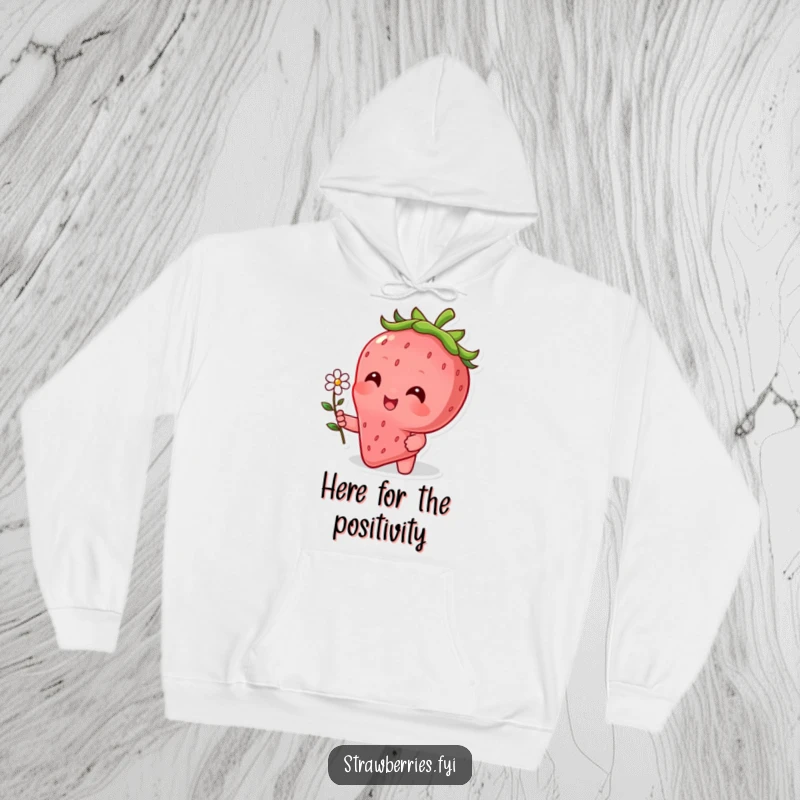 Funny hoodie with a happy strawberry character extending a tiny flower in a gesture of kindness and warmth.