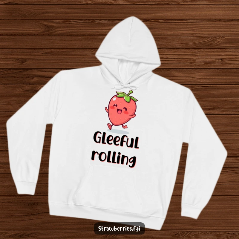 Funny Kawaii strawberry character rolling with glee featured on a cozy hoodie, perfect for comfort.