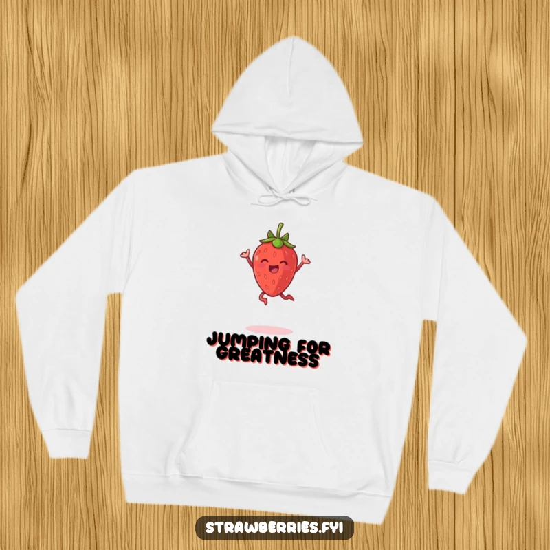 Funny hoodie featuring a delighted anthropomorphic strawberry mid-jump, symbolizing pure happiness and energy.