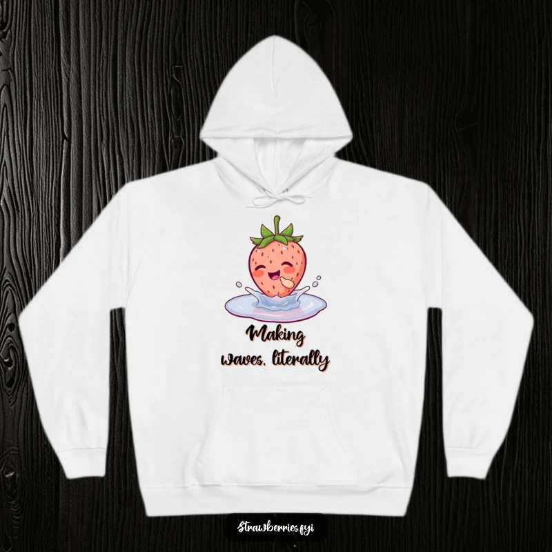Funny hoodie showcasing a delighted strawberry character mid-splash in a puddle, embodying absolute glee and carefree fun.