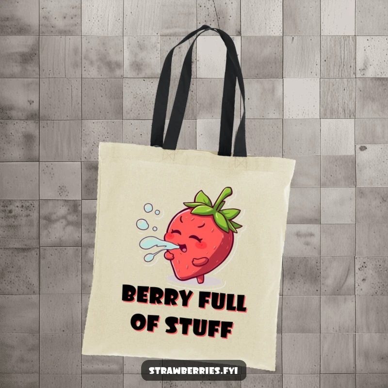 Funny tote bag with a mischievous strawberry character playfully squirting juice, perfect for carrying essentials with humor.