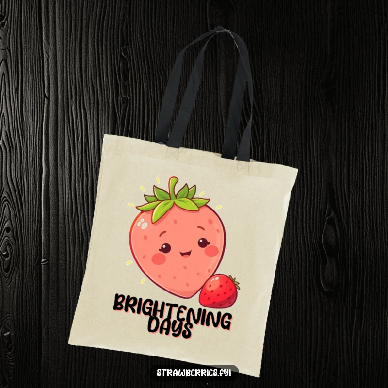 Funny sunny strawberry tote bag featuring a character basking in a warm ray of light, ideal for carrying items with cheerful and humorous flair.